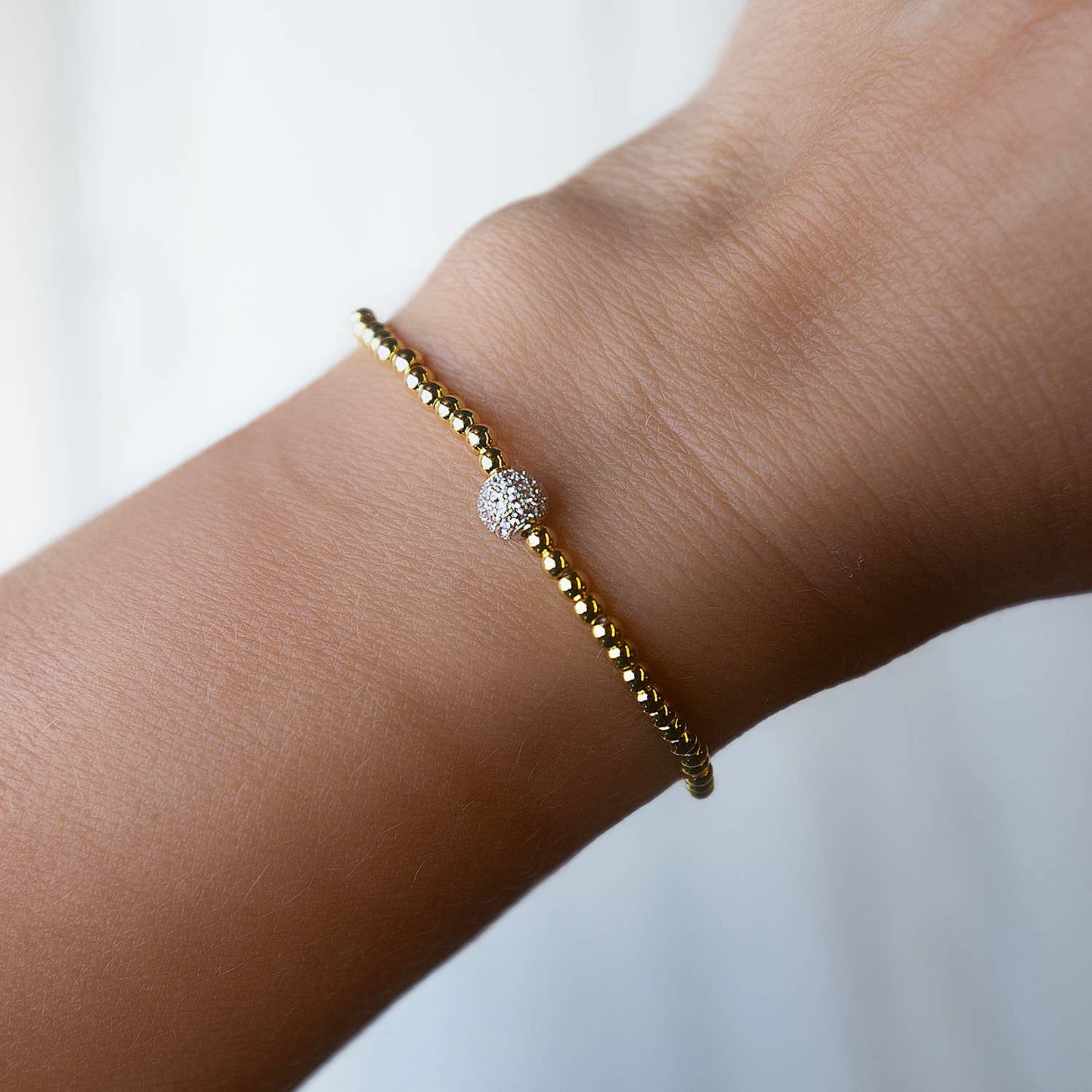 Gold Uno Beaded Bracelets